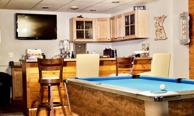 Francis Creek House | Amazing home for 10 with rec room: movie theatre, craps table, pool table & bar!