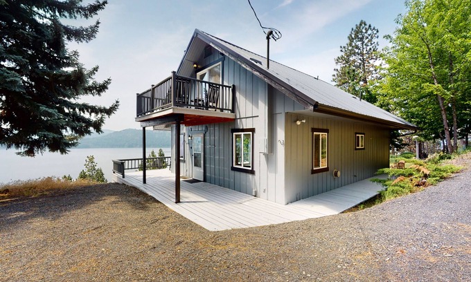 Harrison House | Amazing lake-view cabin with balcony, firepit, grill, wood stove, & W/D