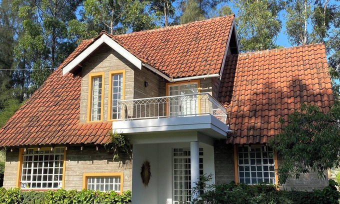 Arusha Villa | Amora Villa, Cozy home with a beautiful lush garden, swimming pool, fitness gym.