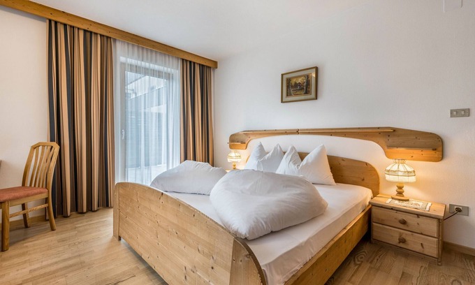 San Giovanni Apartment | Apartment "Residence Griesfeld 75" with Mountain View, Shared Pool & Wi-Fi