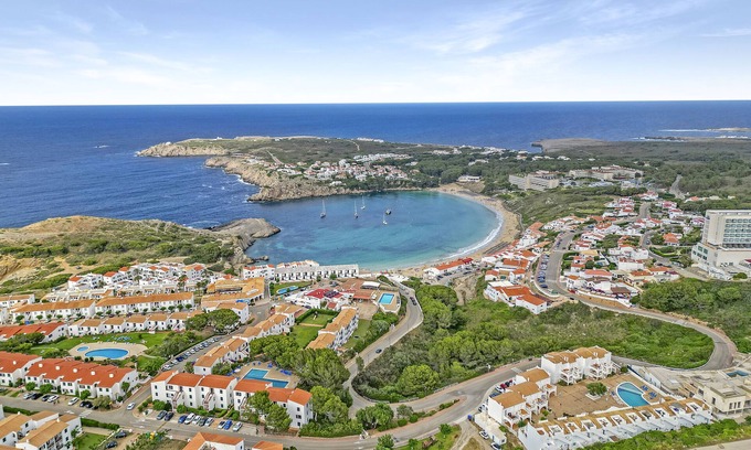 Arenal d'en Castell Apartment | Apartment 'Apartamento 103 Castell Sol' with Shared Pool, Private Terrace and Wi-Fi