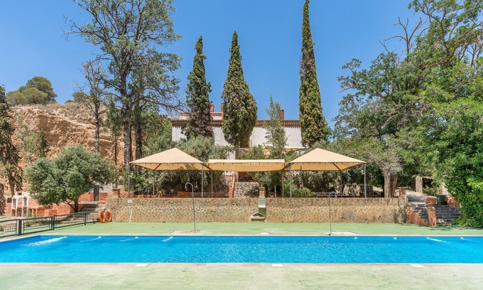 Guadix Apartment | Apartment 'Cueva Beso' with Mountain View, Shared Pool and Wi-Fi