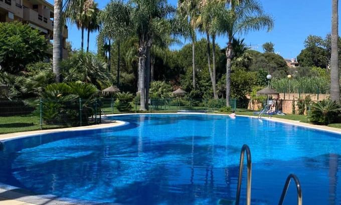 Carib Playa Apartment | Apartment 'Dunas and Beach Marbella Cabopino' with Shared Pool, Wi-Fi and Air Conditioning