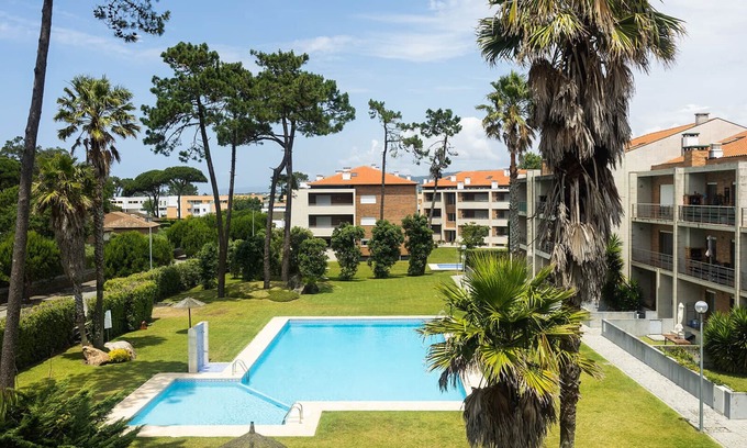 Fao Apartment | Apartment 'Fão' with Shared Pool, Shared Garden and Wi-Fi