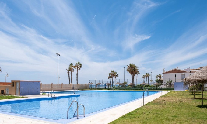 Mezquitilla Apartment | Apartment 'Las Terrazas Primera Línea de Playa' with Sea View, Wi-Fi and Air Conditioning