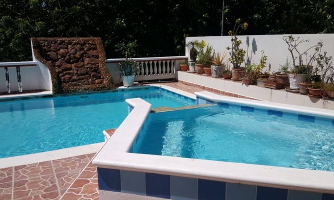 Cabarete Apartment | Apartment steps from a quiet surfing beach, pool/TV/Wi-fi/AC