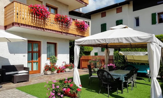 Coredo Apartment | Appartamento "Laghet" a piano terra con giardino