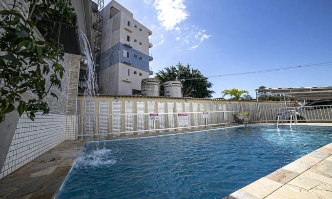 Praia Grande Hotel | Apto 22E ar condicionado e ventilador, 2 quartos, churrasqueira, elevador e piscina