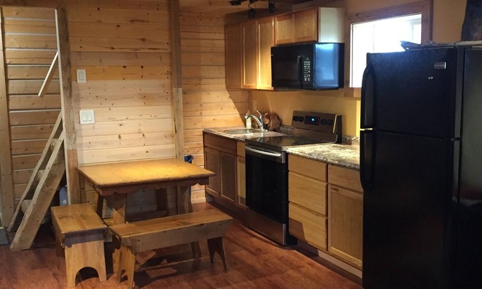 Ester House | Authentic Fairbanks log house with bathroom, kitchen, and screened front porch