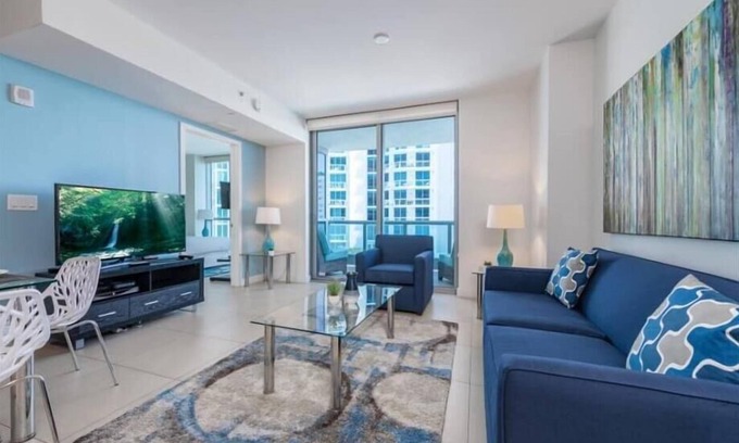 North Beach Apartment | Balcony w/Partial Ocean Views | Work Desk + Wi-Fi | Pool+ Hot Tub | Gym