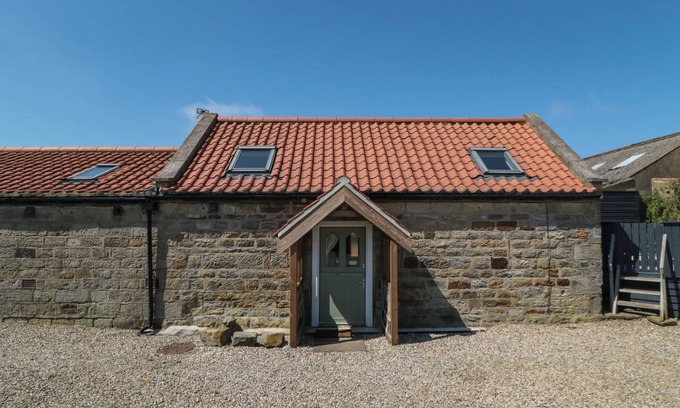 Whitby Cottage | BARN COTTAGE, pet friendly, with a garden in Robin Hood’s Bay