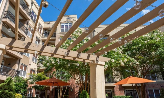 Cary Apartment | Barsala l 2BD Oasis at Arboretum: Stylish & Scenic Views