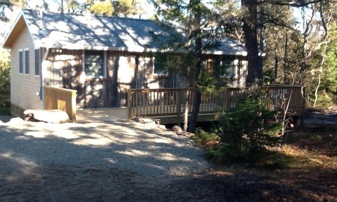Corea Cabin | Be the first to rent this all newly renovated 1930s Log Cabin in Corea.