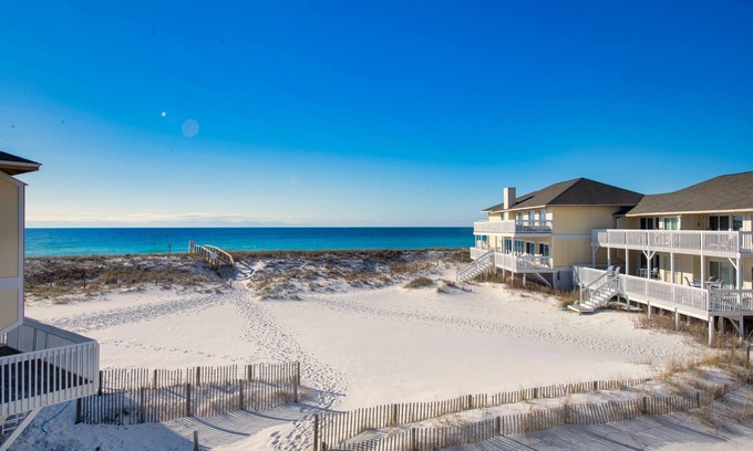 Holiday Isle Condo | Beach front - On the sand - FREE beach Service - Sleeps up to 6. Renovated-clean