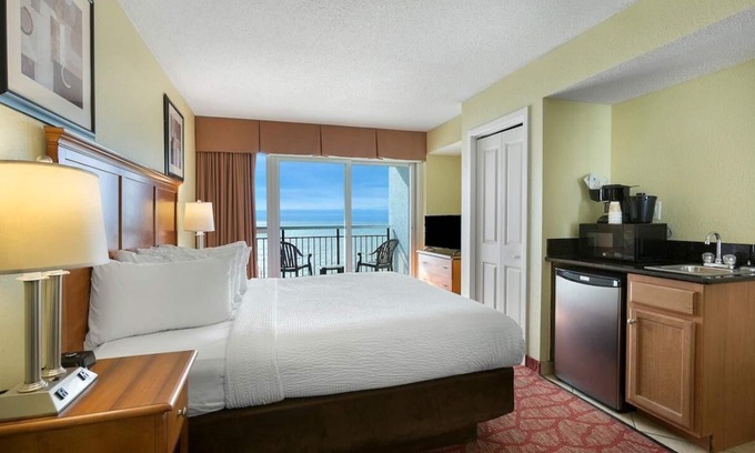 Downtown Myrtle Beach Apartment | Beachfront Beauty: King Room with Scenic Balcony