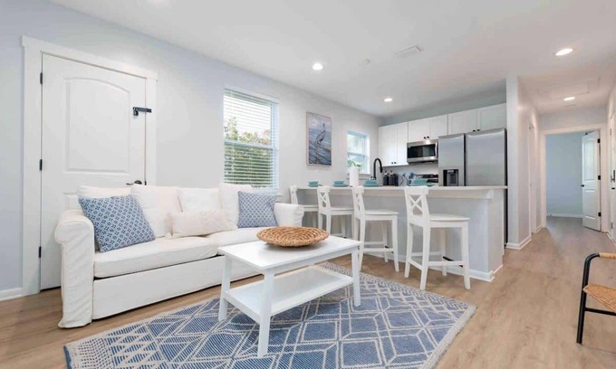 Neptune Beach Apartment | Beautiful coastal condo - walk to the beach!