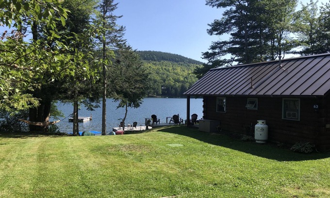 Dedham Cabin | Beautiful cozy Maine log cabin on the water.