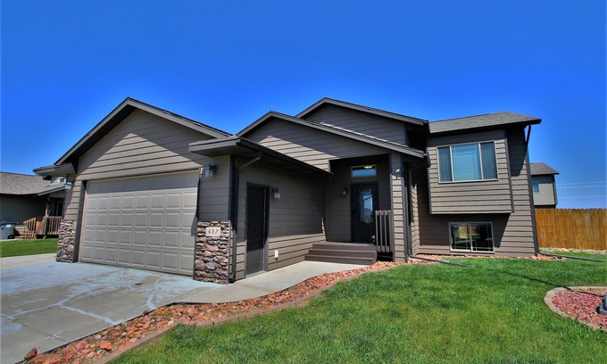 Box Elder House | Beautiful home with large yard and hot tub. Great for families!