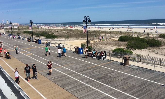 North End Apartment | Boardwalk gem. Enjoy your private deck and watch the ocean.