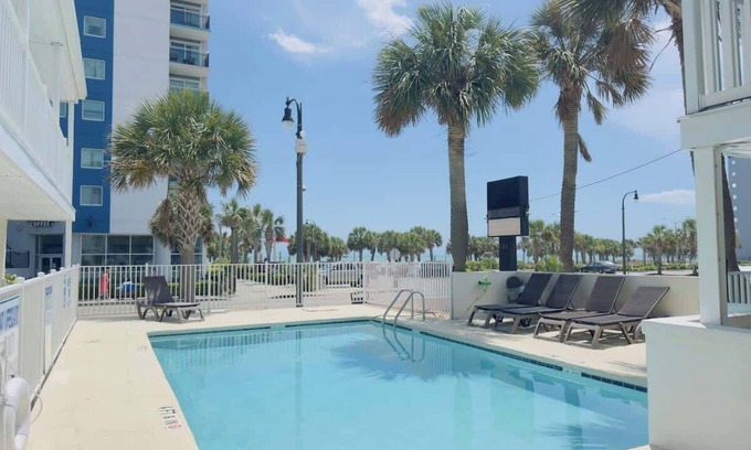 Downtown Myrtle Beach Apartment | Boutique on the beach, Studio #103 + Pool