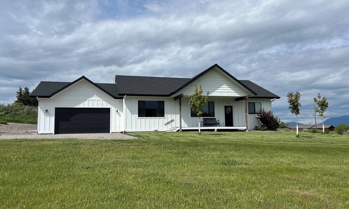 Kalispell House | Brand new house with deck and amazing views on large country lot close to town.
