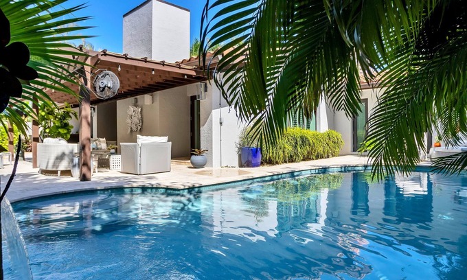 Dolphin Isles House | Breathtaking Oasis, Steps to Beach, Heated Pool, In-ground Spa VIRTUAL TOUR