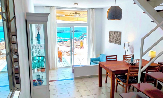 Morro Jable House | Bright and friendly corner house over the harbor of Morro Jable