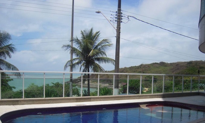 Guarapari Apartment | Building facing elegant Bacutia beach (Blue Cove)