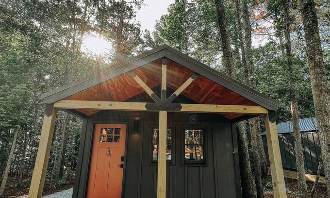 Hartwell RV Rental | Cabin #3: One king-size bed, a full kitchen, and a large gravel parking pad beside the cabin for easy boat or trailer storage.