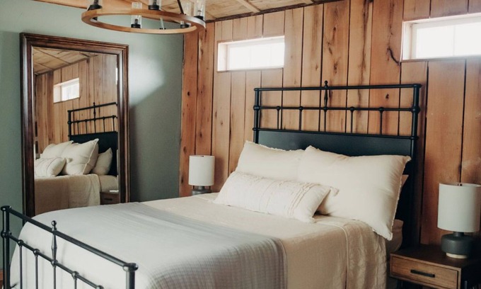 Sunnyland Cabin | Cabin Just Built! features two covered decks, living room, fireplace, kitchen