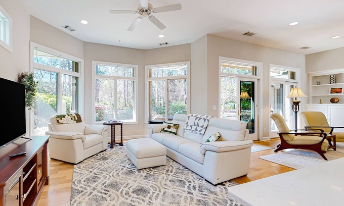 Moss Creek House | Calm home with patio, enclosed yard, tennis court, golf courses, & heated pool