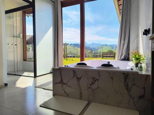 Goncalves Ski Chalet | CASA BELA VISTA -HIDRO - WIFI -PRÓXIMO RESTAURANTES e PIZZARIAS