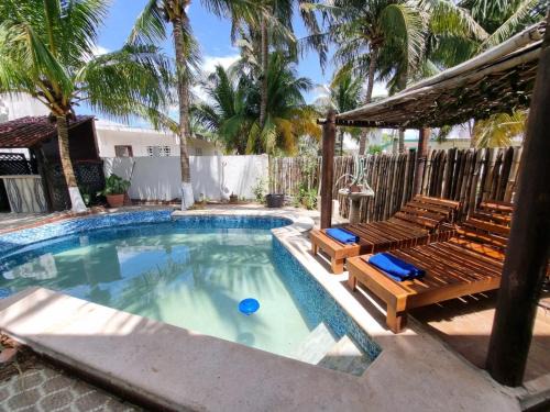 Chuburna Puerto Apartment | Casa Columpios, con alberca a pasos de la playa