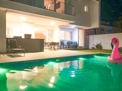 Jurere House | Casa com 4 suítes em Jurerê Internacional