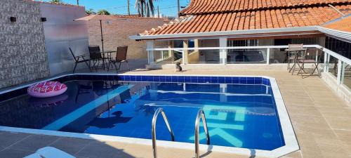 Jardim Praia Grande House | Casa com piscina e Wi Fi em Mongagua SP