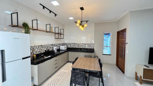 Parnaiba House | Casa confortável com ar no litoral