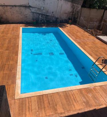Piumhi House | Casa para festas com piscina e cama elástica