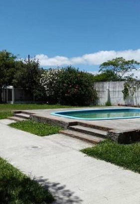 Laranjal House | Casa piscina na praia Laranjal