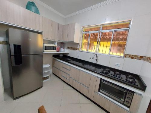 Florida House | Casa Praia Grande Solemar - 3 min da praia