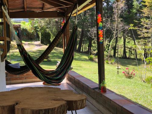 Medellin House | Casa Rustica con chimenea en su interior, rodeado de los cuatro elementos tierra, fuego, aire y agua, ubicada en sector tranquilo, para descansar en familia o amigos,