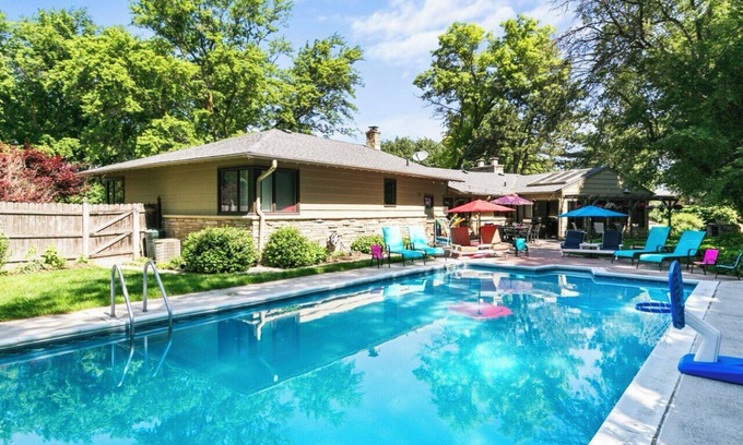 West Omaha House | Central Omaha Pool w/Spa Oasis + Fire Pit + 3 Living Rooms