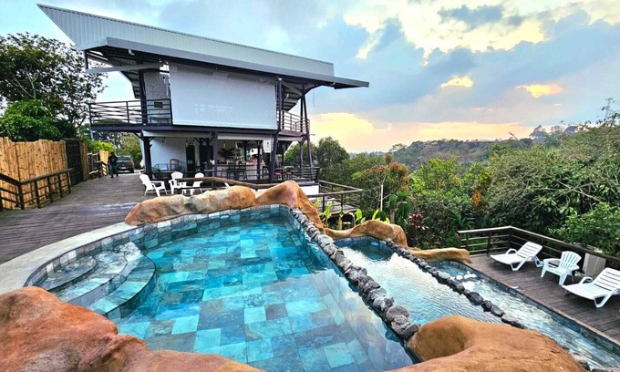 Poas Volcano National Park Ski Chalet | Charming 1-bedroom chalet in lush Poas with cascading pools & raw nature WiFi