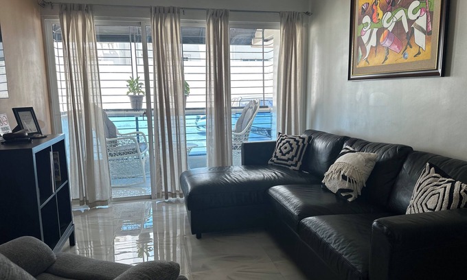 Santo Domingo Oeste Apartment | Charming 3-bedroom apartment with WiFi, AC and a picuzzy in Santo Domingo Oeste.