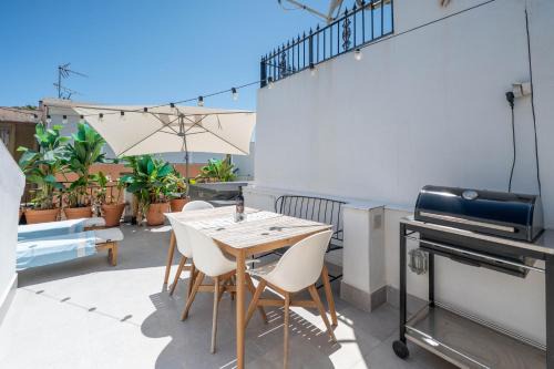 Malaga-Este House | Charming Seaside Home with Jacuzzi & Terrace