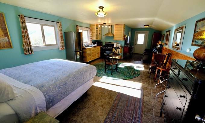 Midpines Cabin | Charming stone clad cabin with views off Highway 140 towards Yosemite