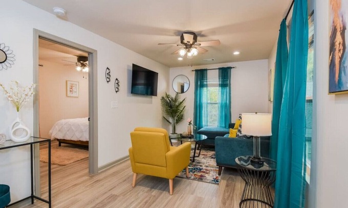 Browns Mill Park House | Cheerful Upstairs Unit of Guest Home with Private Terrace, BBQ Area & Yard Games