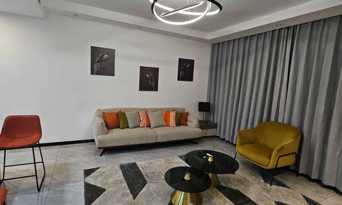 Gombe Apartment | Chic 1-bedroom apartment with balcony and rooftop Riverview pool gym and terrace
