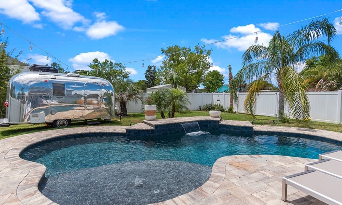 Jacksonville Beach House | Chic Home with Retro Airstream + Heated Pool