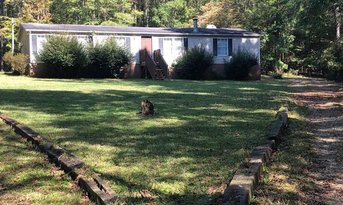 Leesville House | Chrystal Cove a 10 minute walk behind home is Lake Murray