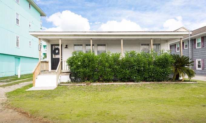North Carolina Coast Cottage | Classic Beach Cottage with front porch view of water